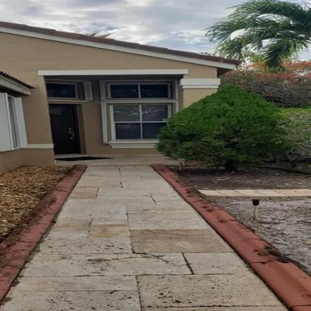 Rent this 3 bed house on 856 Stanton Drive in Weston, FL 33326