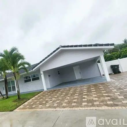 Rent this 4 bed house on 599 NW 12 Th Ave