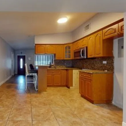 Buy this 3 bed apartment on 13920 Northeast 16Th Court in Archwood, North Miami