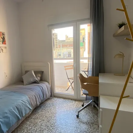 Rent this 4 bed room on Calle de Santiago García in 46100 Burjassot, Spain
