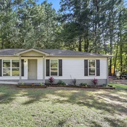 Buy this 3 bed house on 6149 Green Leaf Court Southwest in Covington, GA 30014