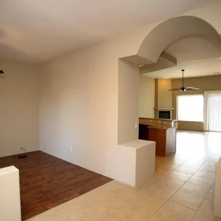 Rent this 4 bed apartment on 11537 North Moon Ranch Place in Marana, AZ 85658