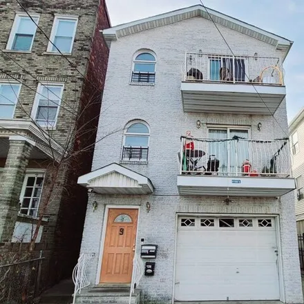 Buy this 8 bed house on 11 Morton Place in West Bergen, Jersey City