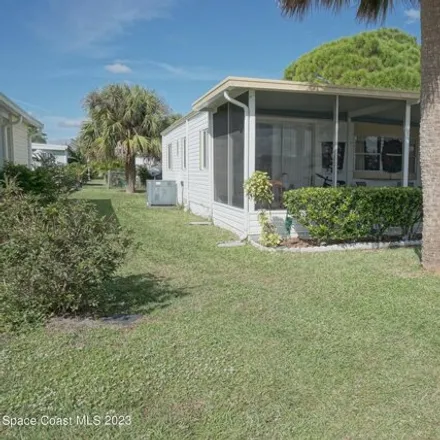 Image 2 - 1007 Buttonwood St, Barefoot Bay, Florida, 32976 - Apartment for sale