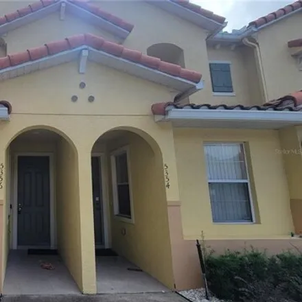 Rent this 3 bed townhouse on 5411 Paradise Cay Circle in Osceola County, FL 34746