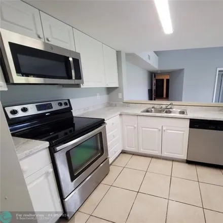 Rent this 2 bed condo on Riverside Drive in Coral Springs, FL 33065