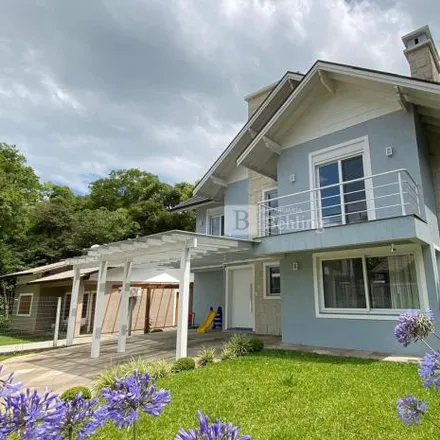 Buy this 4 bed house on unnamed road in Condomínio Vivendas do Arvoredo II, Gramado - RS