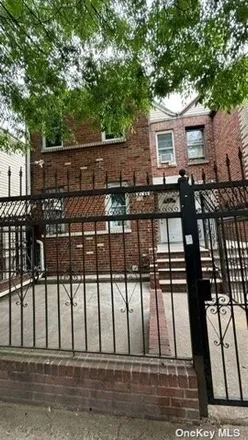 Buy this 8 bed house on 37-15 94th Street in New York, NY 11372