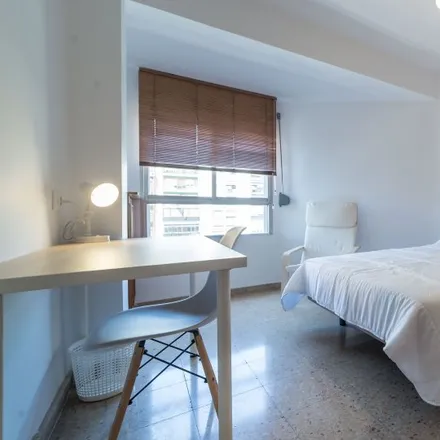 Rent this 6 bed room on Carrer de Rubén Vela in 46006 Valencia, Spain