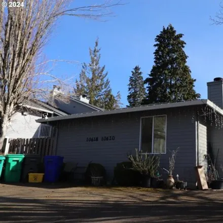 Buy this 4 bed house on 10620 Southwest 49th Avenue in Portland, OR 97219