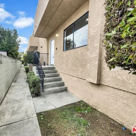 Buy this 3 bed condo on 1698 West 146th Street in Strawberry Park, Gardena