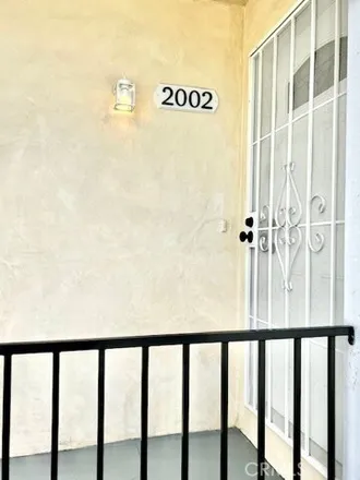 Rent this 3 bed house on 2022 West 106th Street in Los Angeles, CA 90047