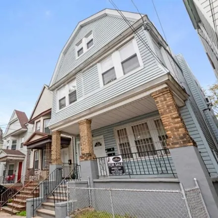 Buy this 8 bed house on 98 Vreeland Place in Jersey City, NJ 07305