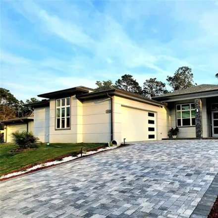 Buy this 3 bed house on 24 Woodbury Dr in Palm Coast, Florida