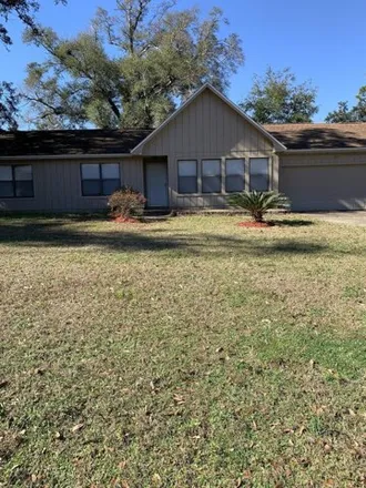 Rent this 3 bed house on 2279 Fuller Street in Ferry Pass, FL 32514