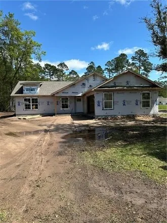 Buy this 4 bed house on 973 Hunters Drive in Glynn County, GA 31525