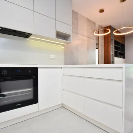 Rent this 2 bed apartment on Biuro sprzedaży osiedla Mieszkaj w Mieście in Odkrywców 13, 31-351 Krakow
