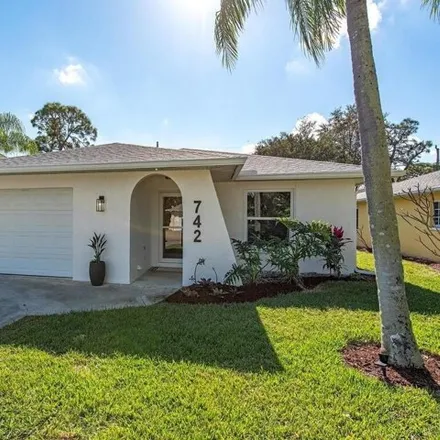 Rent this 3 bed house on 742 99th Avenue North in Collier County, FL 34108