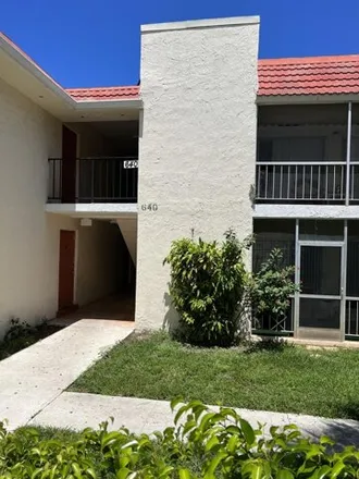 Rent this 2 bed condo on 640 NW 13th St Apt 16 in Boca Raton, Florida