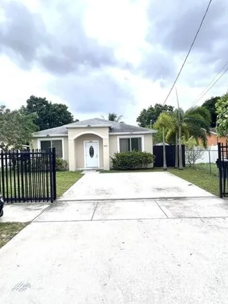 Buy this 3 bed house on 818 Northwest 118th Street in Myricks Trailer Park, Miami-Dade County