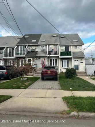 Buy this 3 bed townhouse on 437 Raritan Avenue in New York, NY 10305