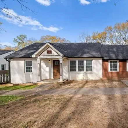 Rent this 3 bed house on 2392 Lynn Iris Drive in Candler-McAfee, GA 30032