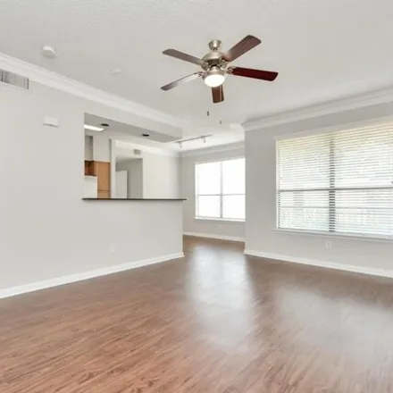 Rent this 2 bed apartment on 2300 McCue Road in Houston, TX 77056