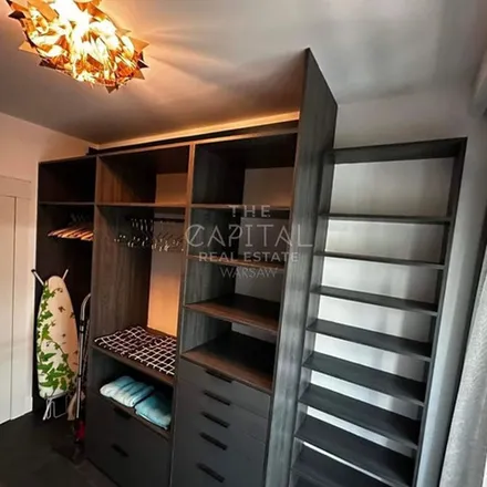 Rent this 4 bed apartment on Mennica Residence in Grzybowska 43A, 00-852 Warsaw