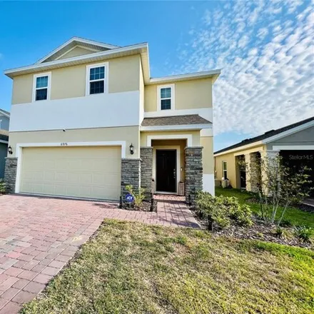 Buy this 4 bed house on 6976 Church Lake Street in Groveland, FL 34736