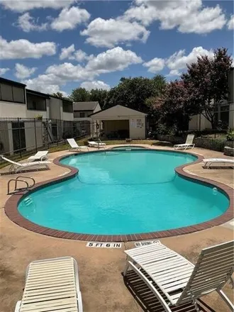 Rent this 2 bed condo on 6713 Raccoon Run in Austin, TX 78736