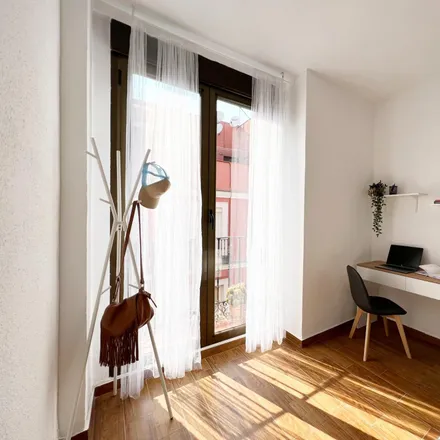 Rent this 9 bed room on La Barbería de Madrid in Calle del Dos de Mayo, 28004 Madrid
