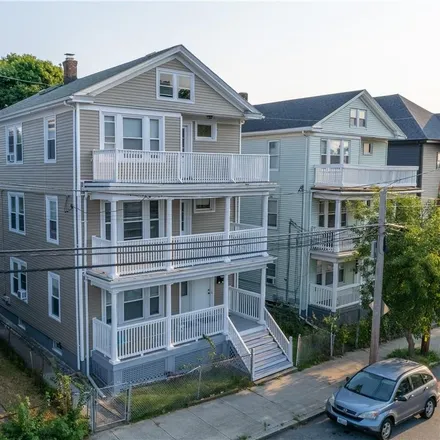 Buy this 6 bed townhouse on 47 Pleasant Street in Providence, RI 02906