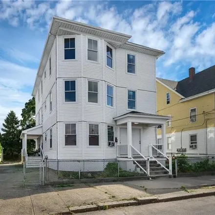 Buy this 9 bed house on 21 Locust St in Pawtucket, Rhode Island