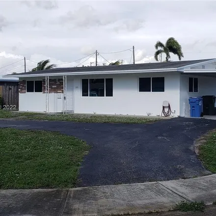 Buy this 4 bed house on Northeast 36th Street in Oakland Park, FL 33334