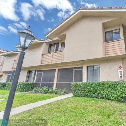 Buy this 3 bed townhouse on West Atlantic Boulevard in Coral Springs, FL 33071