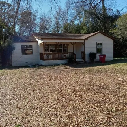 Buy this 3 bed house on 1574 Colonial Drive in Macon, GA 31204