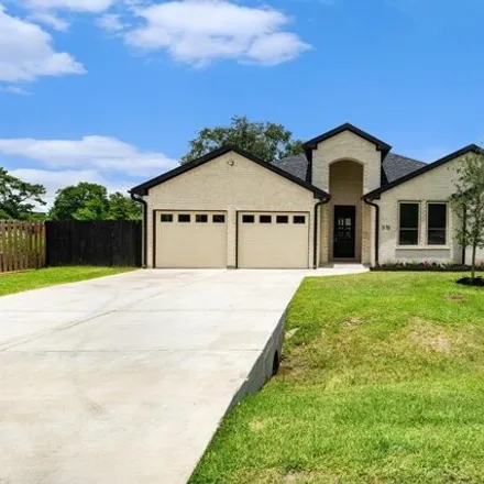 Buy this 4 bed house on 515 Manor Ave in Rosharon, Texas