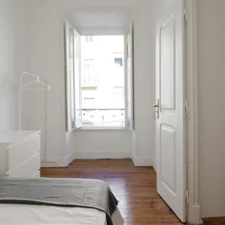 Rent this 5 bed room on Rua António Pedro 141 in 1000-040 Lisbon, Portugal