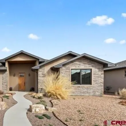 Buy this 2 bed house on 2135 Signature Ridge Lane in Montrose, CO 81401