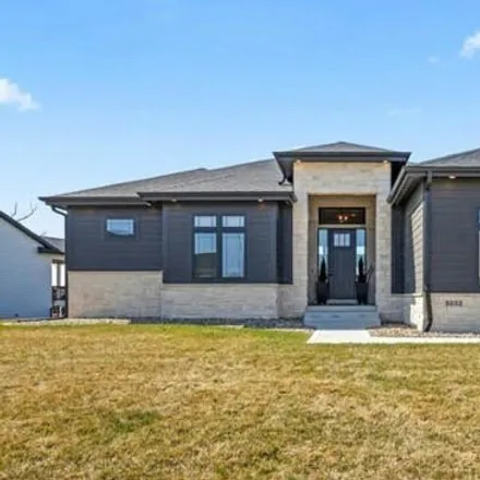 Buy this 4 bed house on Springbrook Trail in Urbandale, IA 50323