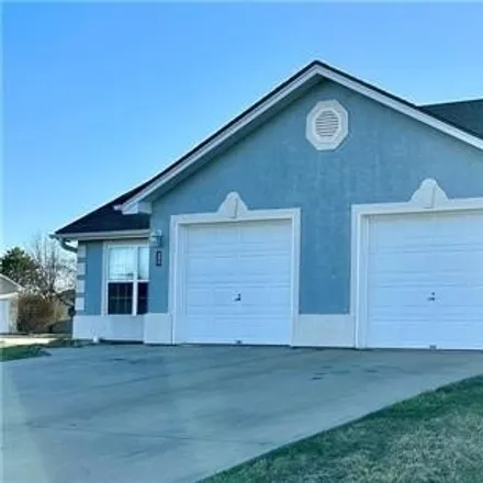 Buy this studio apartment on 3991 Southwest Cheddington Drive in Lee's Summit, MO 64082
