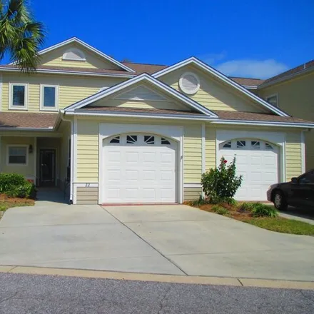 Rent this 4 bed townhouse on 2412 Saint Andrews Boulevard in Panama City, FL 32405