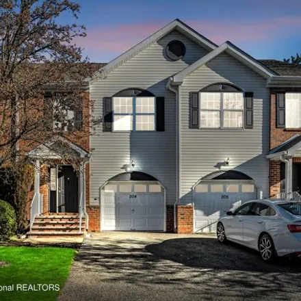 Rent this 3 bed townhouse on 84 Finch Court in Manalapan Township, NJ 07726
