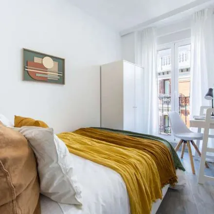 Rent this 8 bed apartment on Madrid in Hostal París, Calle de la Montera