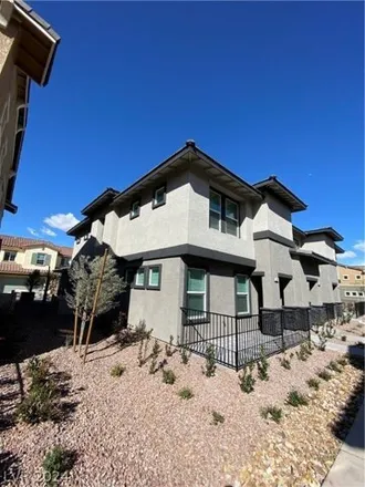 Rent this 3 bed townhouse on Summer Sparrow Avenue in Henderson, NV 89011