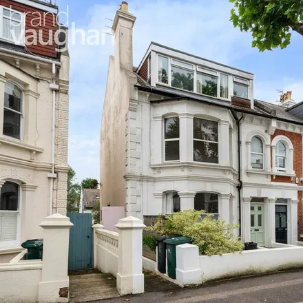 Rent this 2 bed townhouse on Hartington Villas in Hove, BN3 6HD