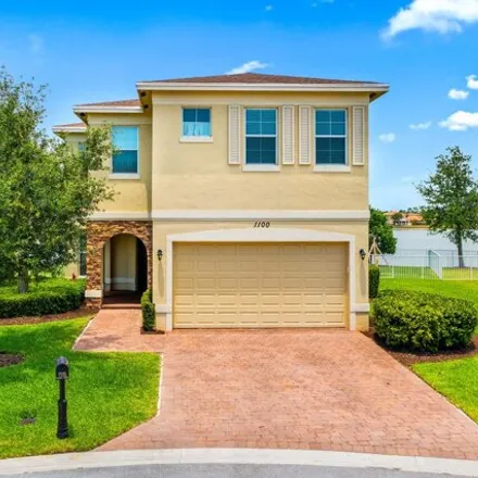 Buy this 4 bed house on 1100 Nw Vivaldi Ct in Port Saint Lucie, Florida