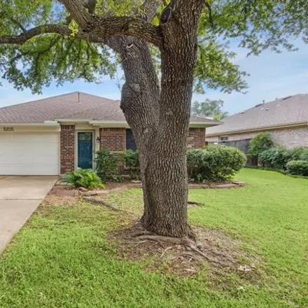 Rent this 4 bed house on 5205 Encinitas Ln in Austin, Texas