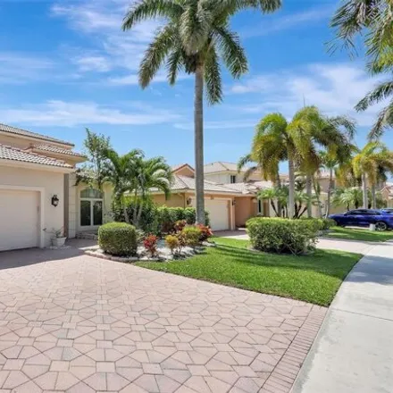 Rent this 4 bed house on 4450 Banyan Trails in Coconut Creek, FL 33073
