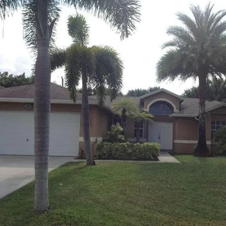Rent this 3 bed house on 1524 Southwest Escobar Lane in Port Saint Lucie, FL 34953